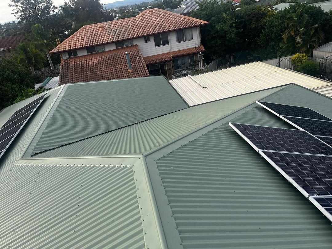 Close-up of a freshly recoated roof surface and ridge capping